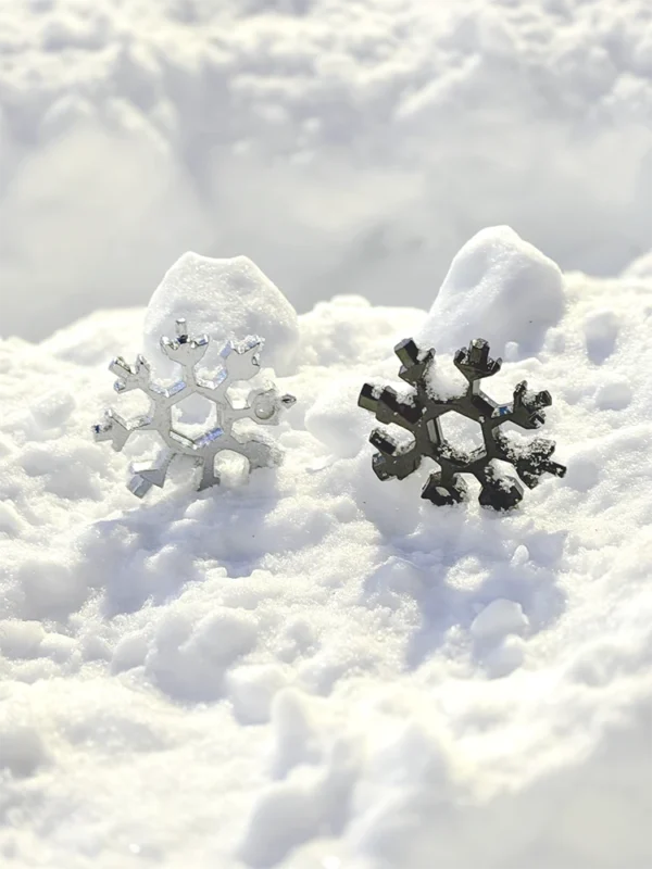 Snowflake multi tool silver and black in snow