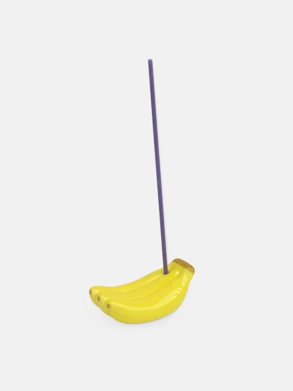 Yellow ceramic banana incense holder sculpture