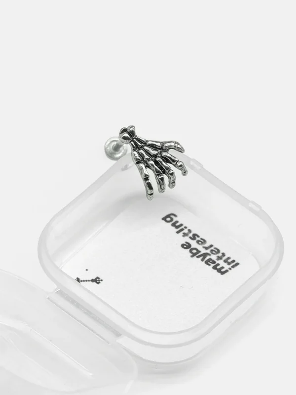 Titanium claw lip piercing in custom packaging