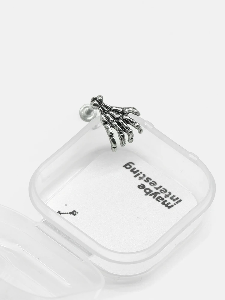 Titanium claw lip piercing in custom packaging