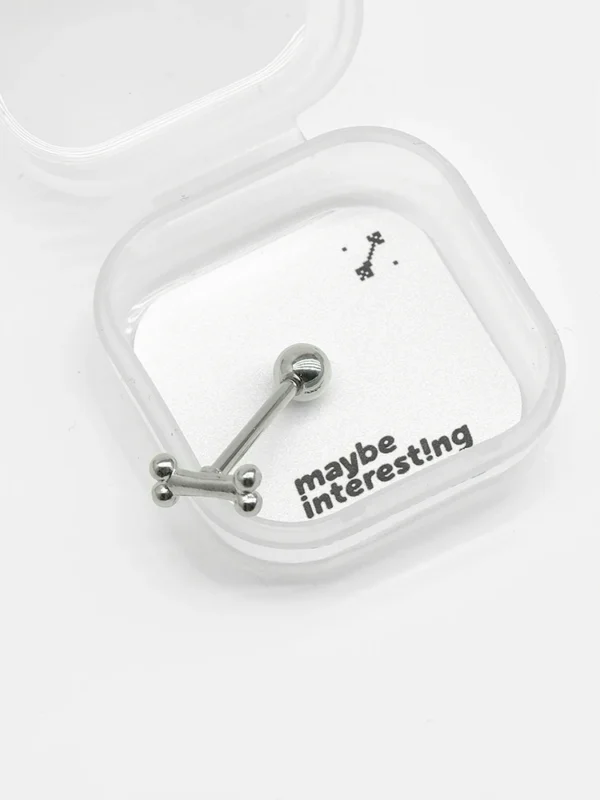 Puppy bone tongue piercing inside custom packaging
