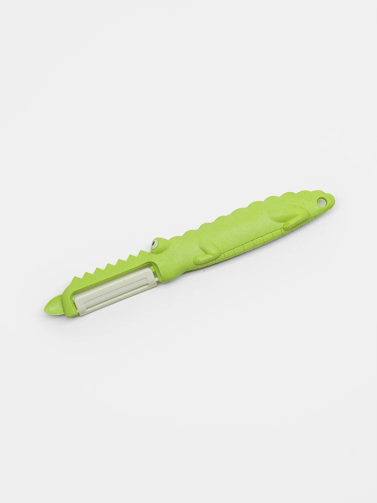 Green crocodile shaped ceramic peeler