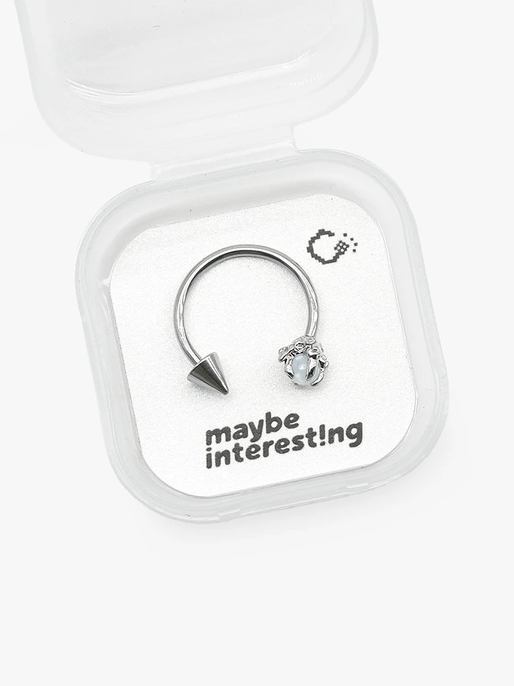 White resin crystal dragon claw lip ring on 8bit graphic card